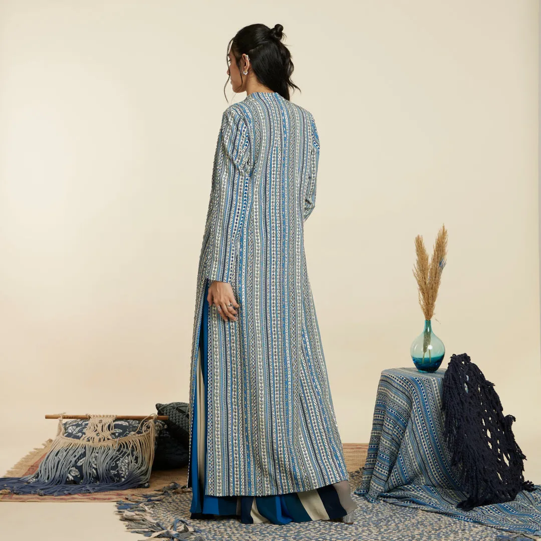 BLUE BOHO JACKET PAIRED WITH BUSTIER AND PLEATED PANTS